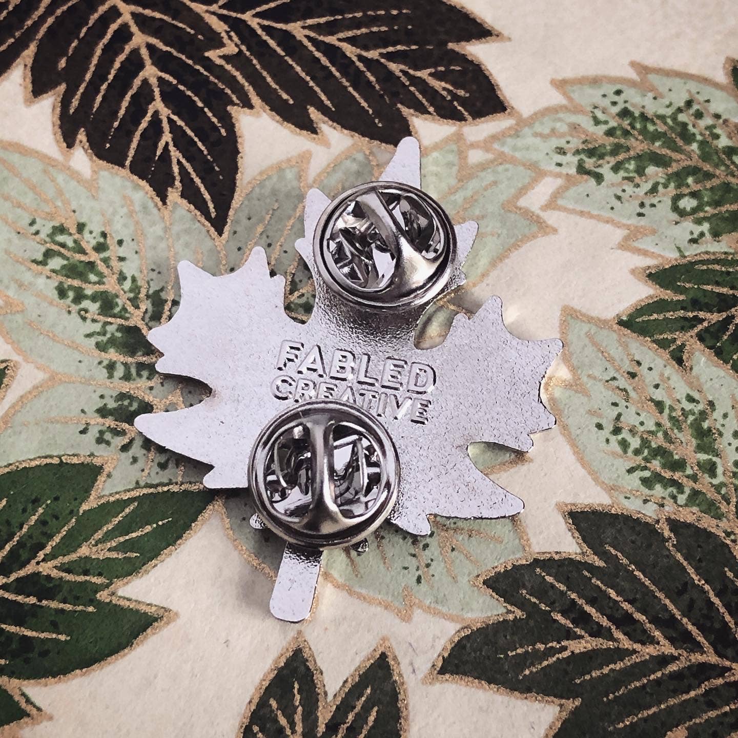 FCC Enamel Pin | Maple Leaf (Silver & Black)