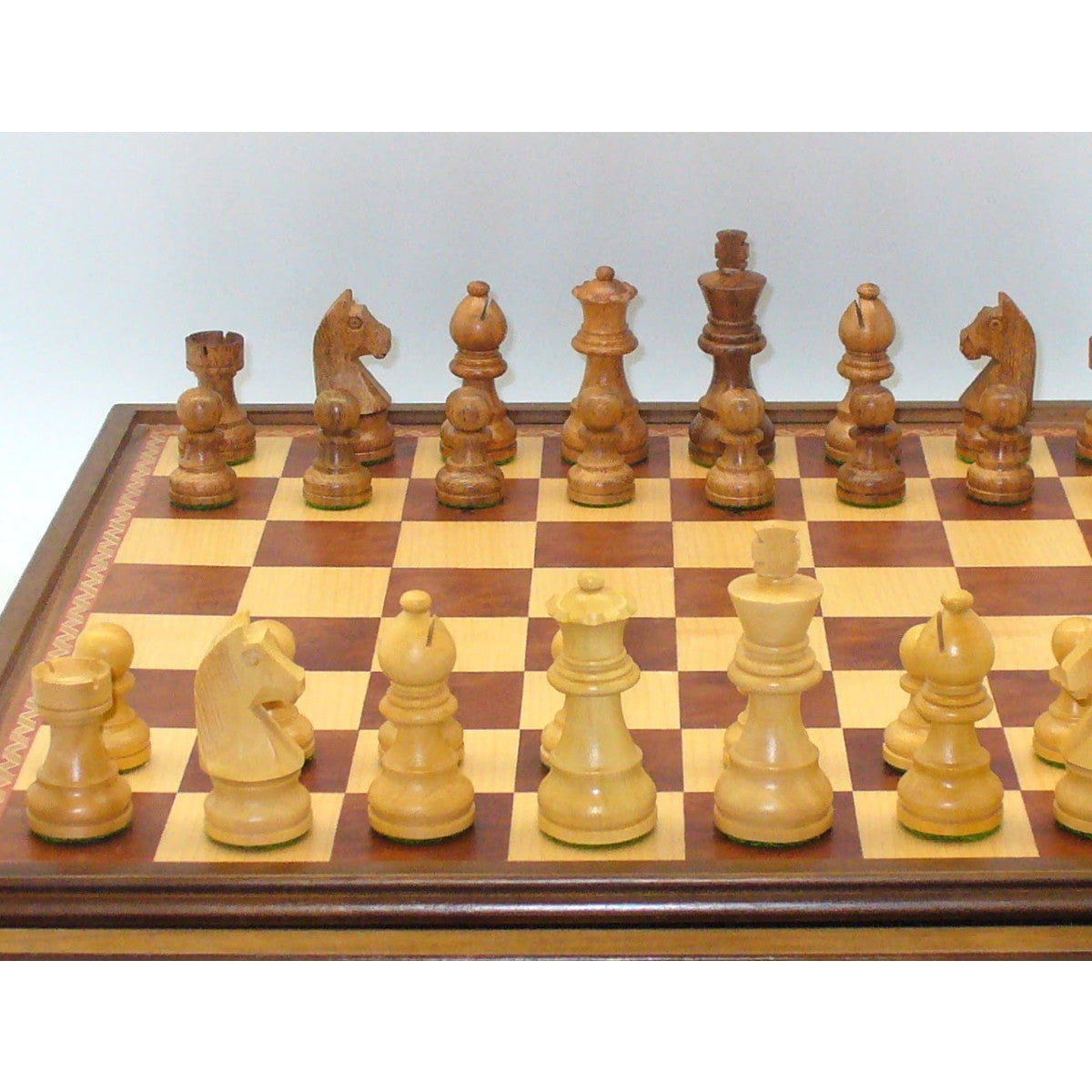 3" Kikkerwood/Boxwood German Style chessmen on Walnut/Maple Chest