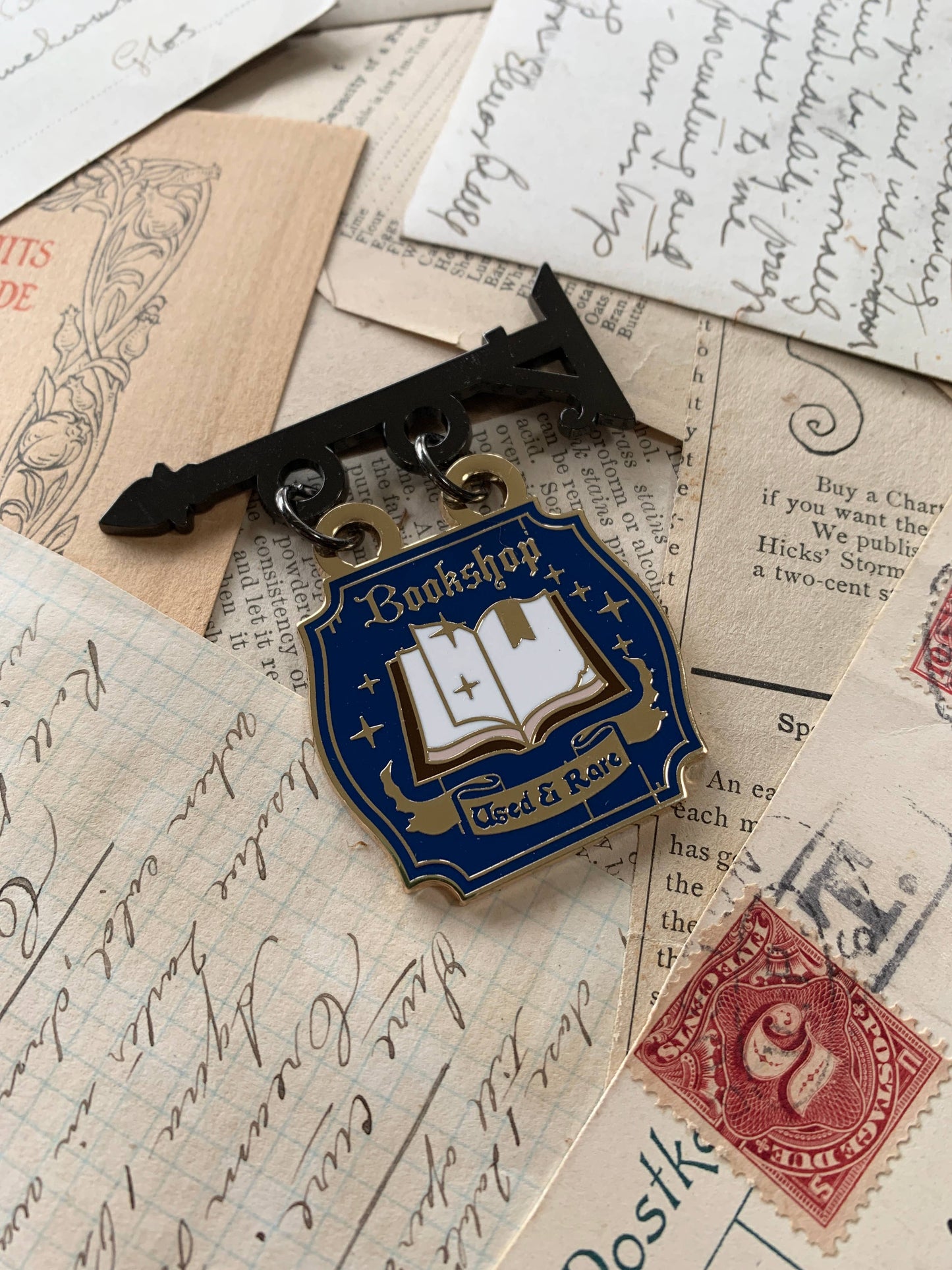 CM Enamel Pin | Bookshop Shop Sign