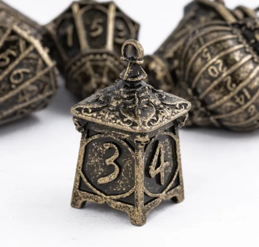 UD "Lanterns" Full Metal Standard Dice Set | Bronze
