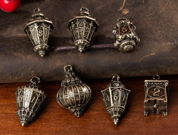 UD "Lanterns" Full Metal Standard Dice Set | Bronze