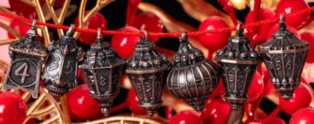 UD "Lanterns" Full Metal Standard Dice Set | Bronze