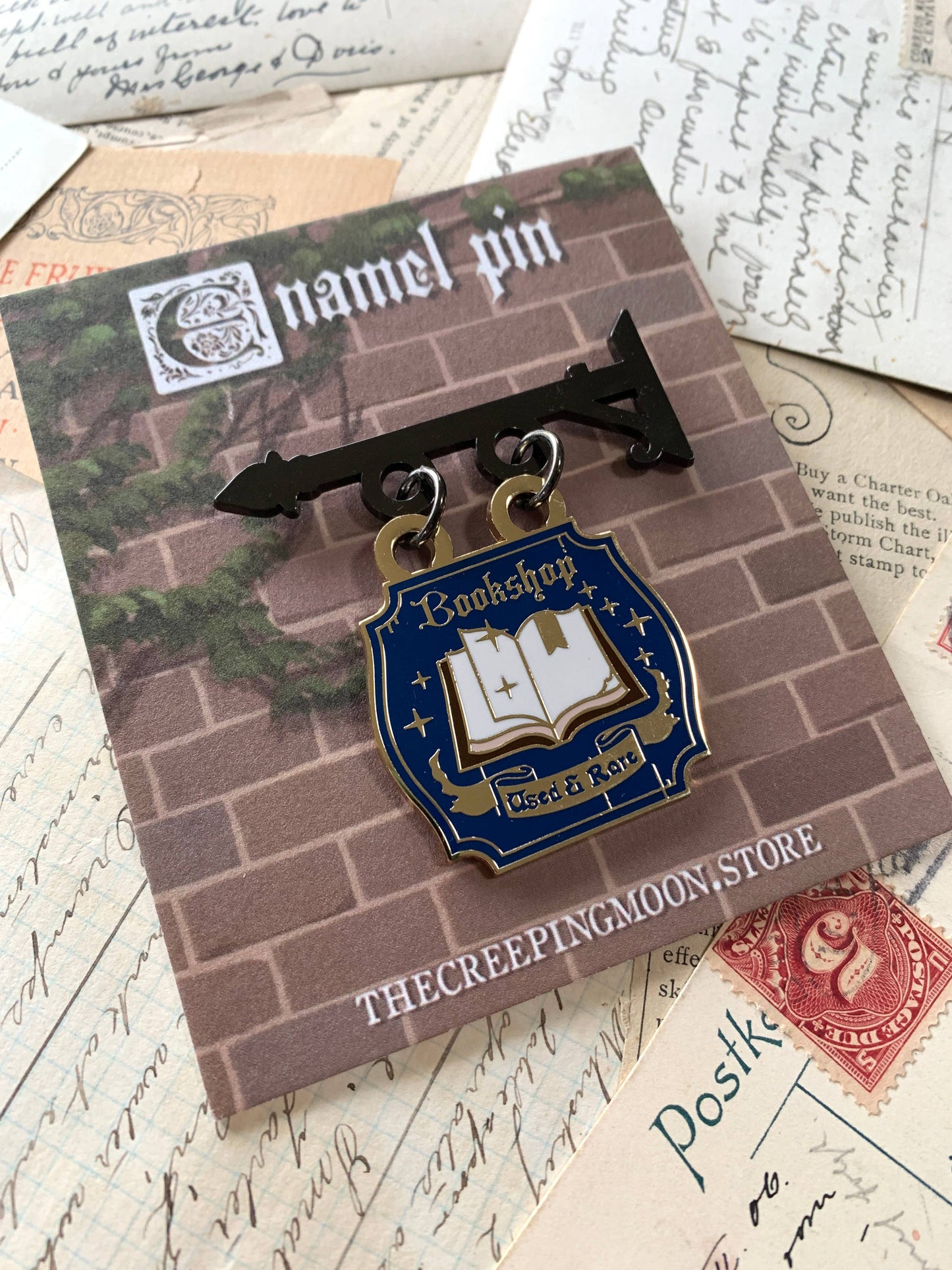 CM Enamel Pin | Bookshop Shop Sign